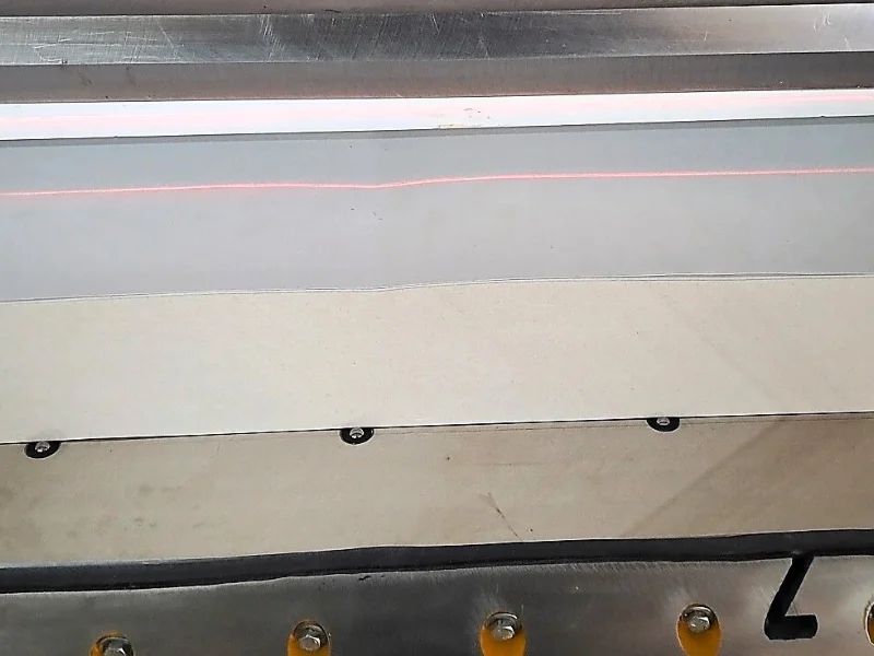 Red Color Laser Light on Paper Bundle